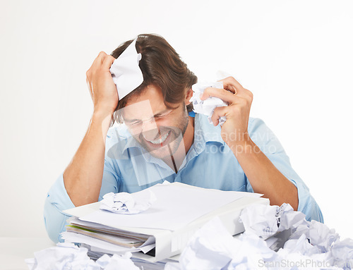 Image of Burnout, stress and businessman with crumpled paper for brainstorming, thinking of bad ideas and strategy. Corporate work, anger and frustrated employee with mess of documents, paperwork and notes