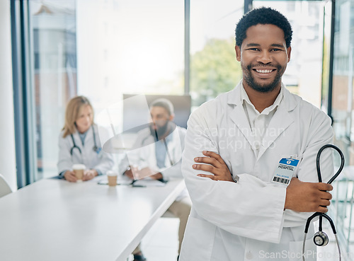 Image of Man, arms crossed or doctor meeting with stethoscope in life insurance planning, medical innovation goals or surgery target ideas. Portrait, smile or happy healthcare worker in teamwork collaboration