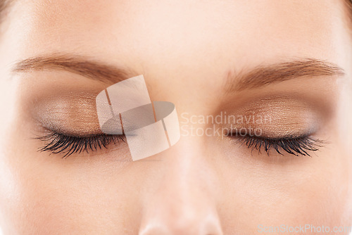 Image of Woman face, closed eyes or makeup cosmetics in beauty skincare, self love routine or product tutorial. Zoom, macro or model and facial eyeshadow, mascara or microblading eyebrows and healthy collagen