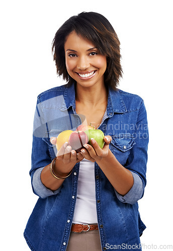 Image of Portrait, happy or black woman with an orange or apple in studio on white background excited with vegan diet. Smile, vitamin c or healthy African girl model with pride or organic fruit fo self care
