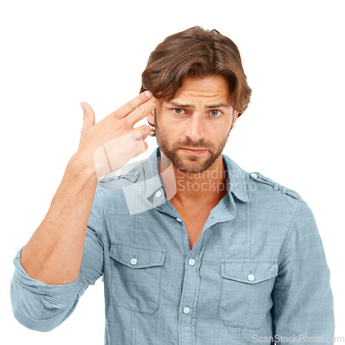 Image of Depression, portrait and gun hand of man for stress, sadness and suicide thoughts with unhappy face. Depressed, stressed and hopeless model with shooting gesture on isolated white background.