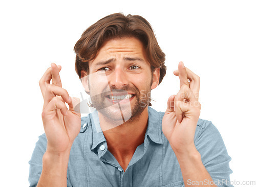 Image of Man hands, face or fingers crossed in anxiety, hope or Canada nervous expression on white background studio. Zoom, model or worried person in wish, good luck or change gesture for new job opportunity