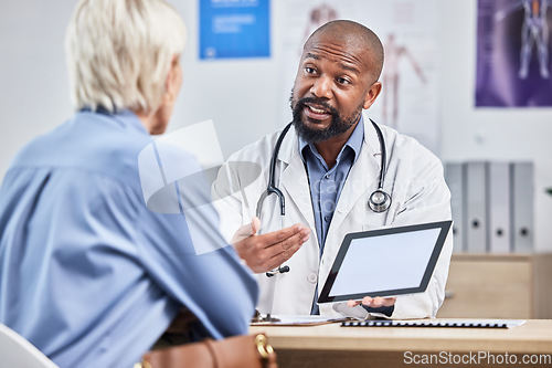 Image of Doctor consultation, tablet mockup and patient consulting black man about medical results, healthcare report or hospital insurance. Mock up product placement, digital tech and advice for senior woman