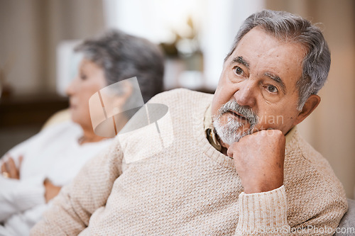 Image of Senior couple, stress and depressed together on home living room couch thinking about divorce, retirement and financial problem or crisis. Old man and woman with conflict in marriage after fight