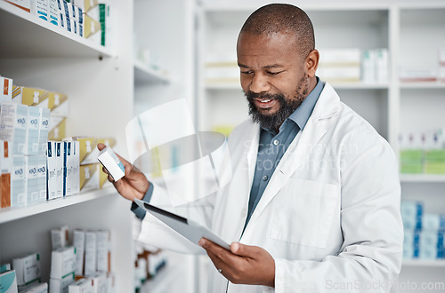 Image of Pharmacy, medicine and black man with tablet to check inventory, stock and medication for online prescription. Healthcare, medical worker and pharmacist with pills, health products and checklist