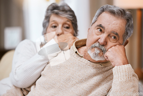 Image of Senior couple, stress and depressed together on home living room couch thinking about divorce, retirement and financial problem or crisis. Old man and woman with conflict in marriage after fight