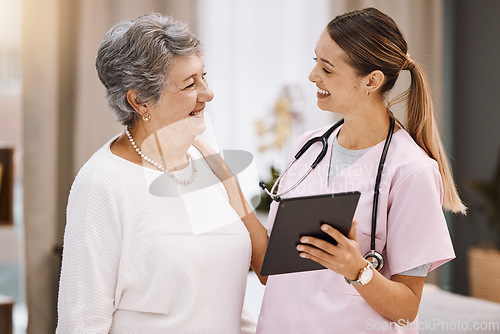 Image of Tablet, healthcare and nurse with senior woman for digital help, support or wellness check, data and results together with smile. Happy elderly patient in communication with medical worker or doctor