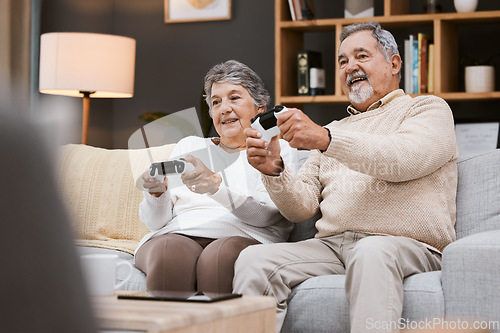 Image of Video game, sofa and senior couple with gaming online in home for happy holiday, retirement and lifestyle together with technology. Excited, elderly and gamer people on a couch with living room games