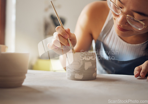 Image of Woman, pottery studio and painting workshop for sculpture product, creative manufacturing and design startup. Painter, ceramics and brush process, artistic pattern and production in small business