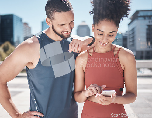 Image of Fitness, workout and black couple with phone in city for running, marathon training and workout. Love, sports and man and woman on smartphone for social media, internet and health progress mobile app