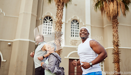 Image of City, fitness or people running in a marathon race, sports exercise or cardio workout outdoors. Motivation, healthy runners or happy black man training with senior woman for targets or body goals