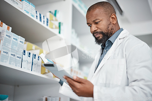 Image of Pharmacy, medicine and black man with tablet to check inventory, stock and medication for online prescription. Healthcare, medical worker and pharmacist with pills, health products and checklist