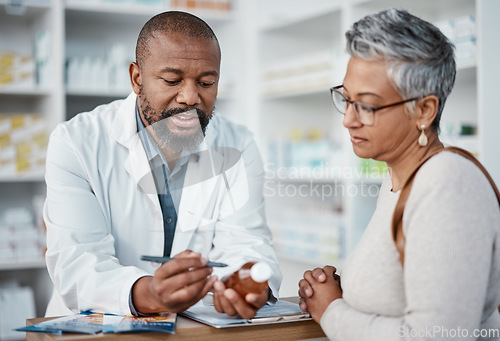 Image of Pharmacy, black man and woman with healthcare medicine and conversation for instructions. Pharmacist, female patient or medical professional talking, stress or explain prescription to senior customer