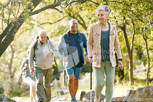 Image of Hiking, elderly and people, happy outdoor with nature, fitness and fun in park, exercise group trekking in Boston. Diversity, friends and happiness with hike, active lifestyle motivation and senior.