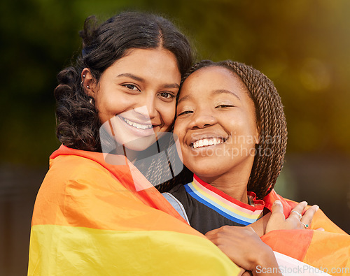 Image of Lesbian, couple and women hug, lgbtq relationship with smile together and commitment with flag and pride in portrait. Happy, equality in sexuality and freedom to love, lgbt community and diversity