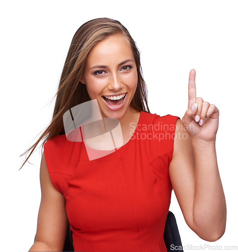 Image of Woman, happy and smile pointing up with finger for idea, solution or plan against a white background. Portrait of isolated attractive female model smiling and posing with recommendation