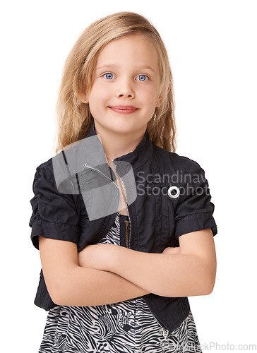 Image of Arms crossed, smile and portrait of a girl for fashion on a white background in studio. Stylish, fashionable and headshot of a child model with pride, confidence and happiness on a studio background