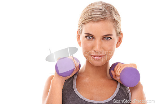 Image of Studio portrait, dumbbells and woman at training, muscle development and wellness by white background. Weightlifting model, smile on face and isolated for fitness, workout or exercise with body goals