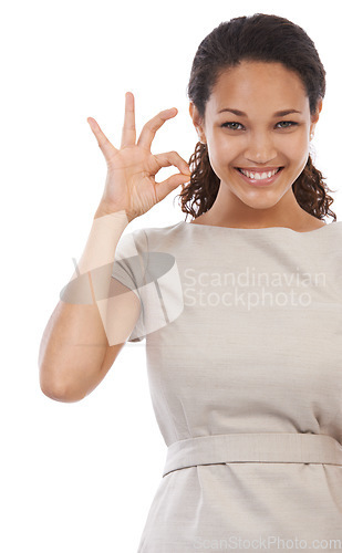 Image of Ok, success and portrait of woman on a white background for motivation, agreement and encouragement. Marketing, advertising and face of girl isolated in studio for approval, confidence and yes sign