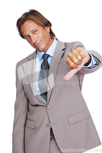 Image of Businessman, thumbs down and bad news, disappointment or failure against a white studio background. Portrait of a isolated business man pointing down thumbs in disapproval, wrong or incorrect gesture