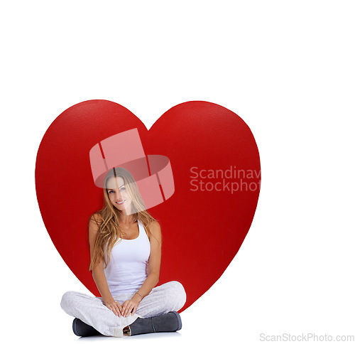Image of Heart, love and portrait of relax woman with big red object, romantic product or emoji icon for Valentines Day holiday. Beauty, happy smile and model girl with studio care symbol on white background