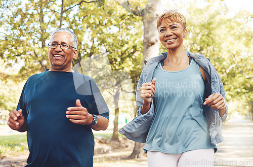 Image of Senior runner couple, park and fitness with smile, teamwork or motivation for wellness in summer sunshine. Happy elderly man, woman and running team by trees for exercise, health or outdoor workout