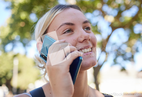 Image of Phone call, park and communication with a woman talking on her mobile during a summer day outdoor. Smartphone, networking and nature with an attractive young female in a garden over the weekend