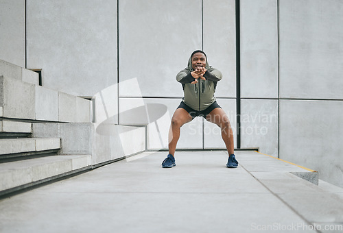 Image of Fitness, exercise or man stretching body in training, exercise or workout with focus, resilience or commitment. Warm up, mindset or healthy sports athlete with goals or motivation on city stairs