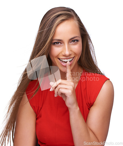 Image of Flirty, smile and portrait of woman with a finger for a secret, gossip or silence isolated on a white background. Quiet, gesture and model with hand on mouth and lips for quiet and silent expression