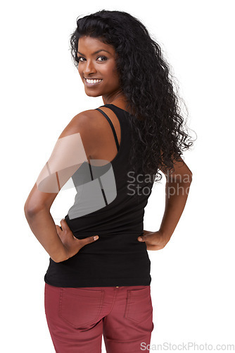 Image of Portrait, back and fashion with an indian woman standing hands on hips in studio on a white background. Attitude, style and beauty with an attractive young girl posing in contemporary clothes