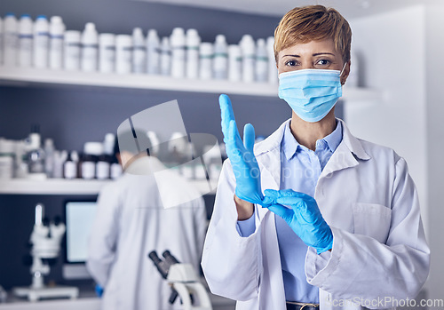 Image of Covid, portrait or senior scientist in a laboratory working on biotechnology for medical healthcare innovation. Coronavirus, black woman or doctor in face mask or gloves helping with science research