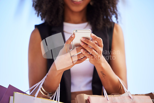 Image of Hands of black woman, smartphone and outdoor for shopping, retail and social media for connection, typing and city. Female, girl and cellphone for ecommerce, check online sales and boutique purchase