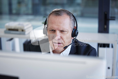 Image of Call center, computer and businessman confused in telemarketing, virtual communication or software service for information technology. Frustrated, mistake and corporate worker, consultant or agent