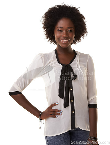 Image of Portrait, fashion and afro with a black woman in studio isolated on a white background while standing hand on hip. Model, style and african with an attractive young female in contemporary clothes