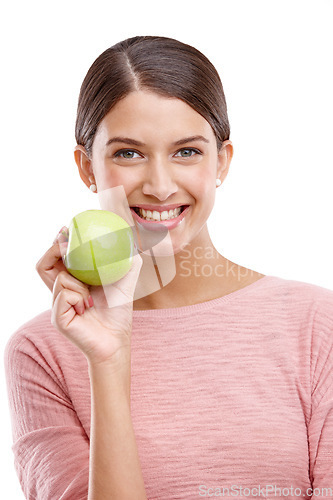 Image of Health, apple and smile with portrait of woman for nutrition, diet and weight loss choice. Fiber, food and vitamins with isolated face of girl eating fruit for wellness, organic and natural in studio