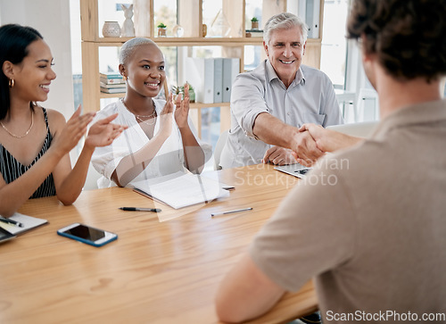 Image of Business people, meeting and applause for handshake, ceo or black woman in office for promotion. Corporate team, shaking hands and congratulations for partnership, collaboration or success in startup