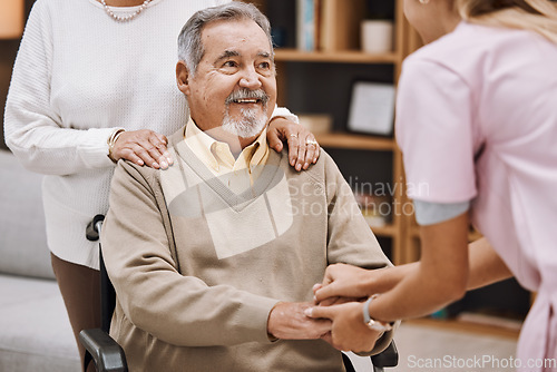 Image of Disability patient holding hands with doctor for senior help, support and trust home nursing, physical therapy and healthcare. Medical worker consulting elderly man in wheelchair in caregiver welcome