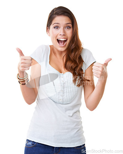 Image of Young woman, portrait and thumbs up with motivation, wow smile and success against white background. Support, review and positive mindset with excited face, yes and agreement, OK with thank you