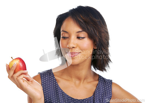 Image of Health, thinking or black woman eating an apple in studio on white background with marketing mockup space. Choice, decisions or thoughtful African girl advertising a healthy natural diet for wellness