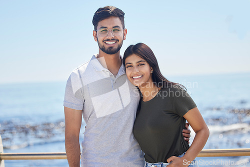 Image of Love, ocean portrait and couple hug, relax and enjoy outdoor quality time together for peace, freedom and romantic date. Beach, sea and man and woman bond on travel holiday in Rio de Janeiro Brazil