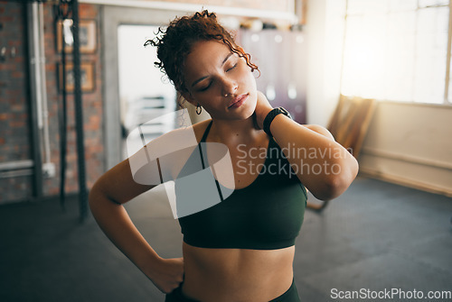 Image of Fitness, shoulder pain and woman with an injury at gym after strength training or exercise. Sports, medical emergency and injured girl athlete with muscle sprain, ache or inflammation in sport center