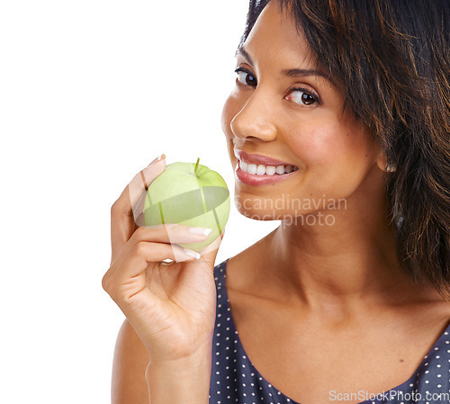 Image of Black woman, studio portrait and apple with smile, nutrition or diet for healthy cholesterol, vitamin c or eating by backdrop. Woman, happy or green fruit for health, energy or wellness by background