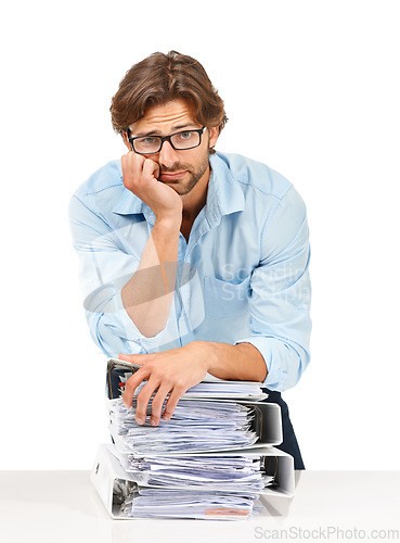 Image of Burnout, stress and businessman with stack of paperwork on desk for deadline, corporate project and report. Ideas, vision and tired employee thinking with pile of files, review papers and documents