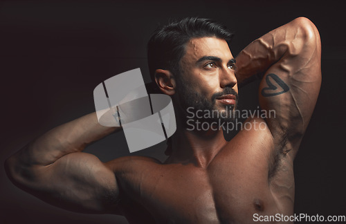 Image of Man, body or muscle on black background in studio for fitness goals, workout or training motivation and healthcare wellness check. Bodybuilder, sports athlete or model flexing on aesthetic backdrop