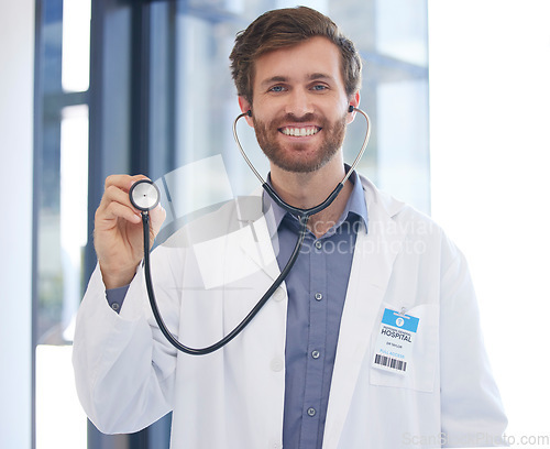 Image of Cardiology doctor and portrait of man at hospital with expert stethoscope for medical evaluation. Healthcare, cardiologist and professional worker with equipment for heart health consulting.