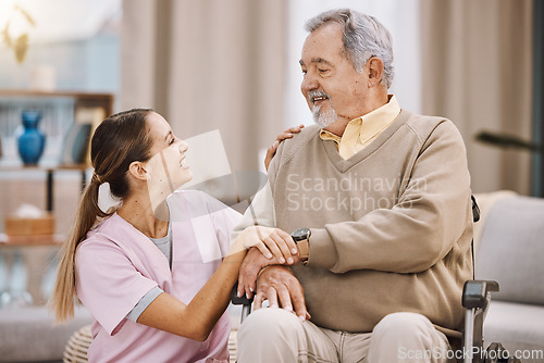 Image of Healthcare, disability and man in wheelchair with nurse in retirement or nursing home with smile on face. Senior care, happy disabled grandpa and woman caregiver in living room at home in Mexico