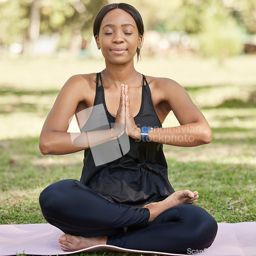 Image of Yoga, black woman meditation in park and mindfulness, zen outdoor in nature. Peace, spiritual energy and chakra balance with self care and stress relief. Fitness, wellness with body care and namaste
