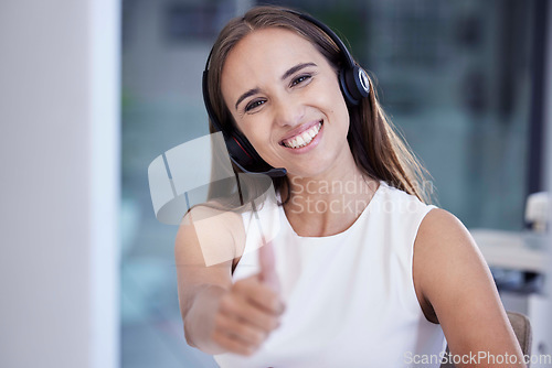 Image of Call center, thumbs up and woman in portrait for telemarketing, virtual communication or telecom success, like and support. Thank you hand sign of corporate worker, consultant or agent for contact us