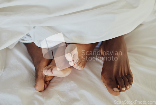 Image of Intimate couple feet in bedroom for love, valentines day and sexual partner with morning passion at home. Top view of man, woman and foot with intimacy, relax and sleeping together in erotic marriage