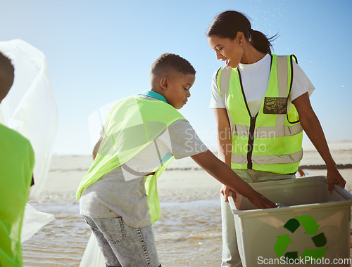 Image of Recycling, ocean and woman with children or group at cleaning for volunteering on earth day support, help and community. Family and mother with recycle box for pollution, climate change and ecology
